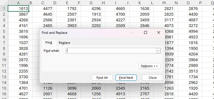 Bảng tính Excel chứa các số ngẫu nhiên, với hộp thoại &quot;Tìm và Thay thế&quot; đang mở, sẵn sàng để tìm kiếm dữ liệu.