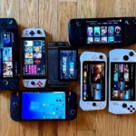 Các mẫu máy chơi game cầm tay PC phổ biến như Lenovo Legion Go, Steam Deck, ROG Ally và AYANEO xếp cạnh nhau trên sàn nhà, minh họa sự đa dạng của thị trường handheld gaming.