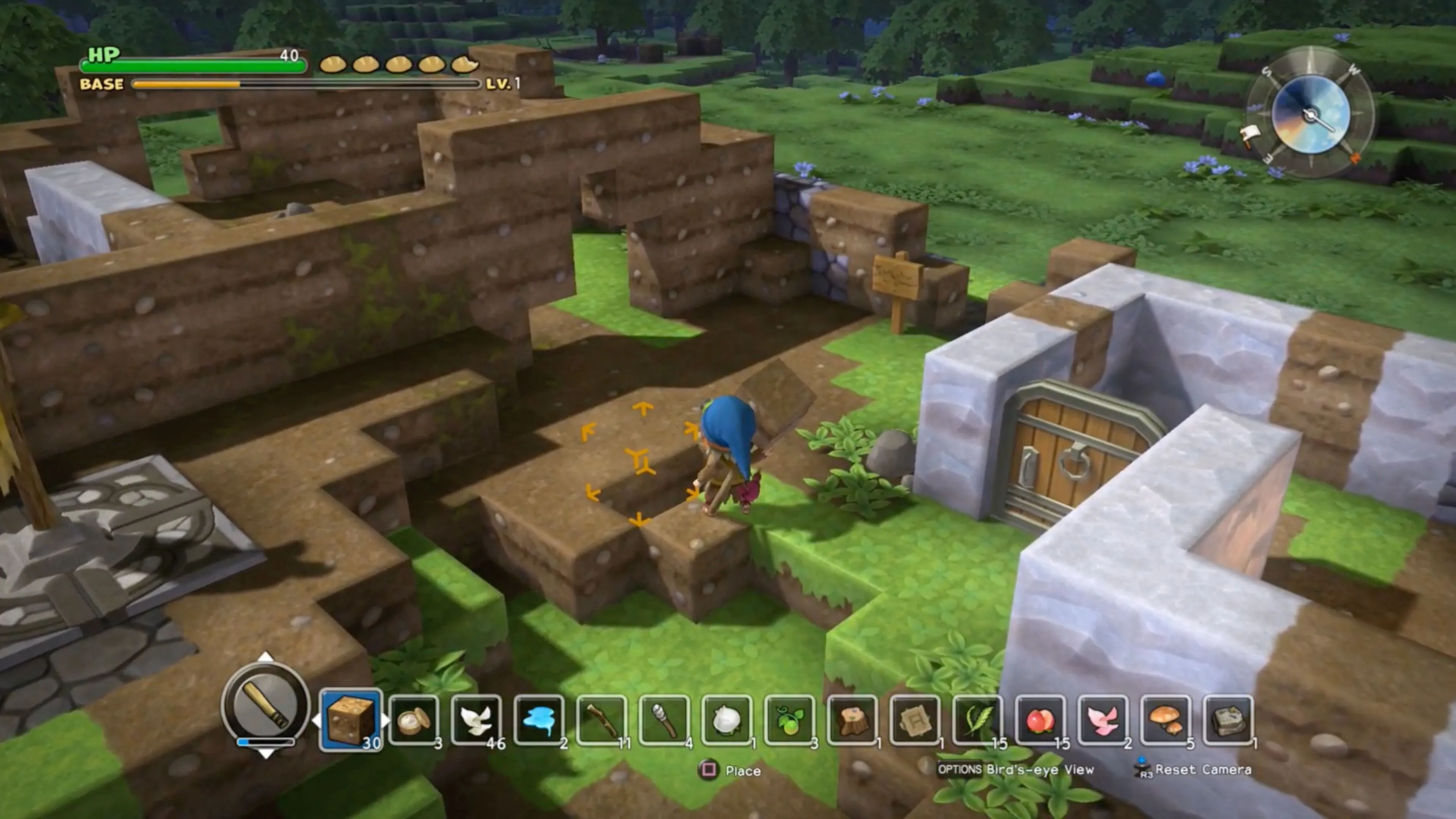 Cảnh chiến đấu với quái vật trong thế giới khối hộp của Dragon Quest Builders