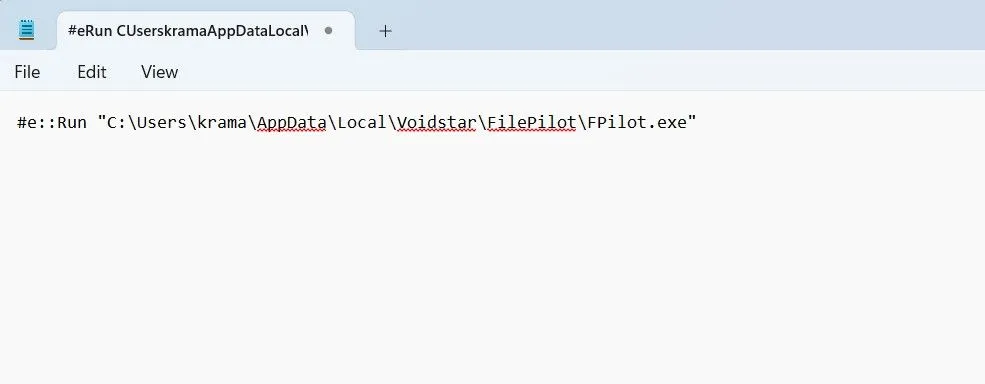 Cửa sổ Notepad với đường dẫn File Pilot trong script AutoHotkey