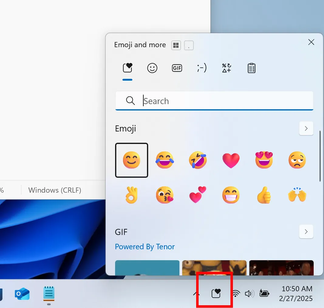 Hình ảnh biểu tượng emoji trên thanh tác vụ Windows 11 và panel mở rộng