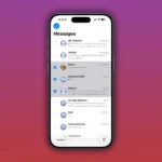 Kéo hai ngón tay để chọn nhiều cuộc trò chuyện trong ứng dụng Tin nhắn trên iPhone iOS.