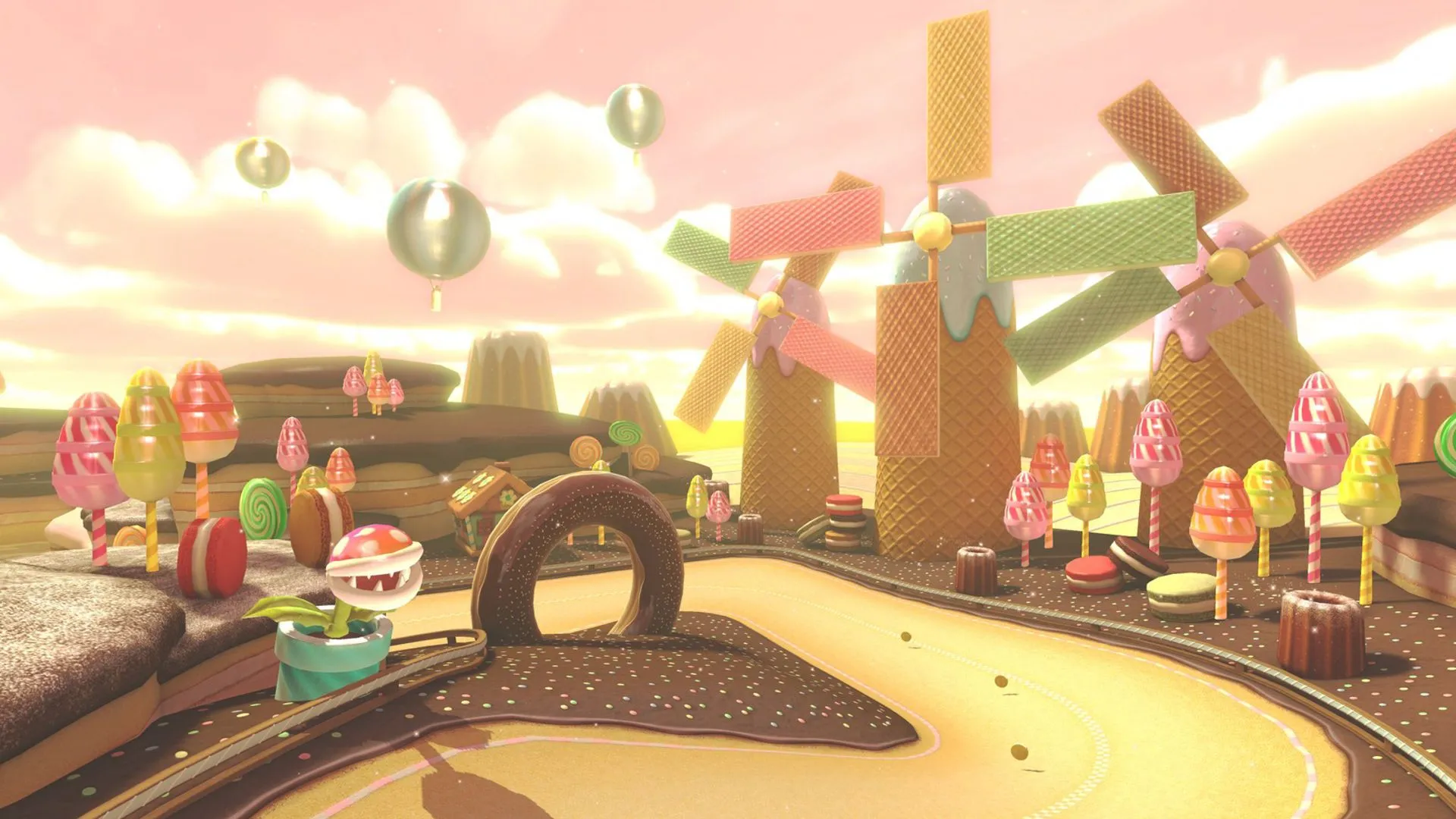 Màn hình giới thiệu đường đua Sweet Sweet Canyon với chủ đề kẹo ngọt trong Mario Kart 8 Deluxe.