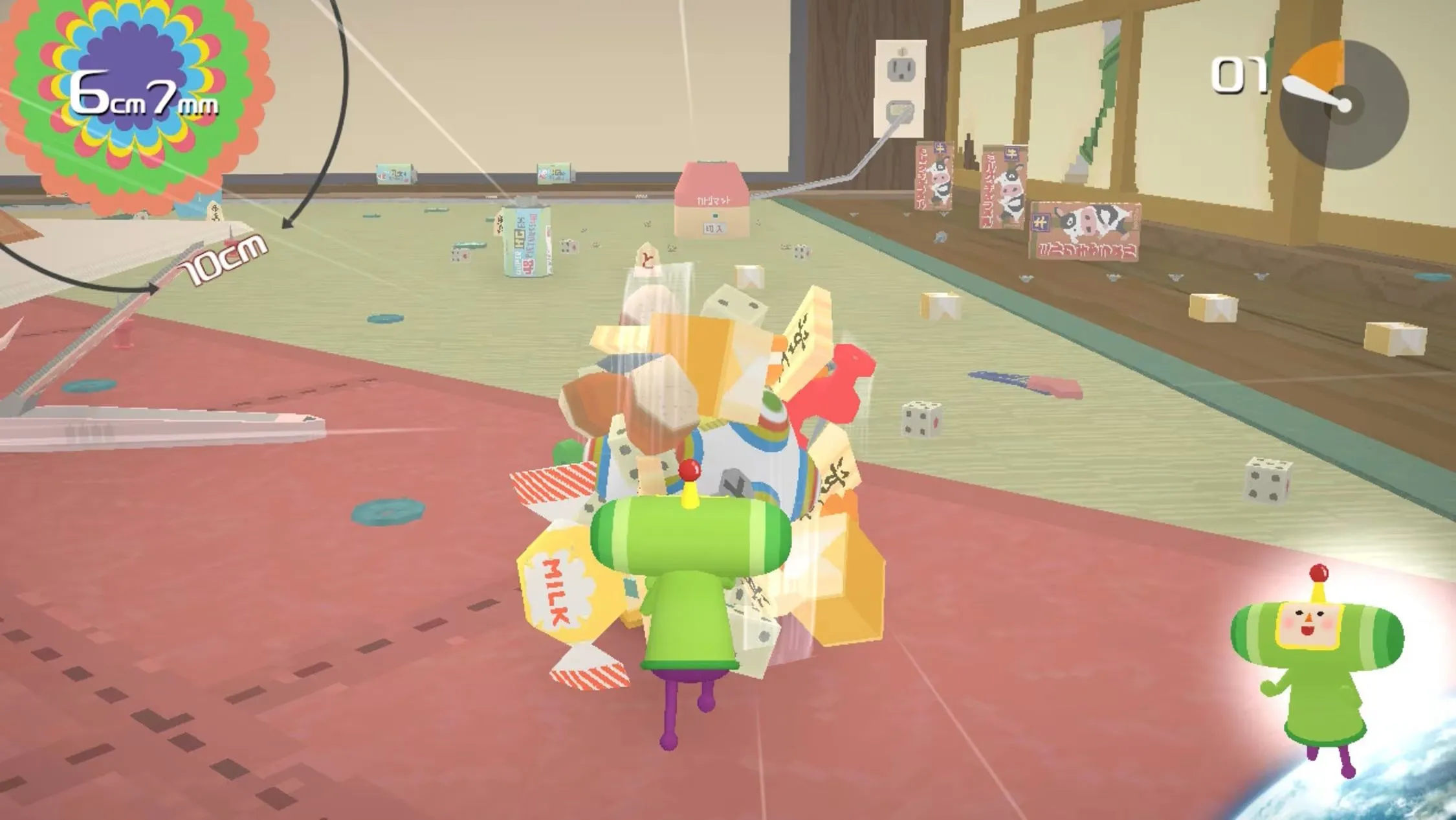 Nhân vật đang lăn một quả bóng khổng lồ chứa đầy rác trong Katamari Damacy REROLL